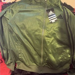 Olive green addidas track jacket.